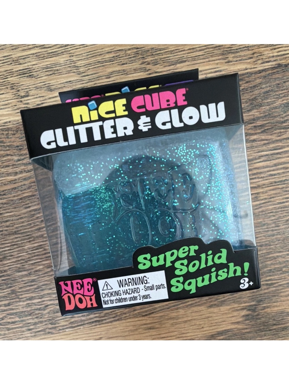 Authentic NeeDoh Nice Cube Glitter & Glow Super Solid Squish - Teal Glitter